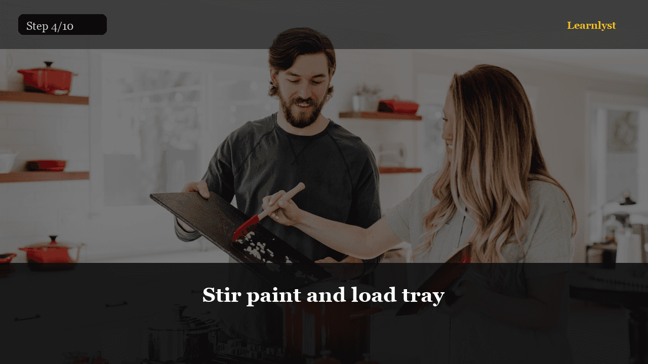 Stir paint and load tray — Home & DIY tip photo